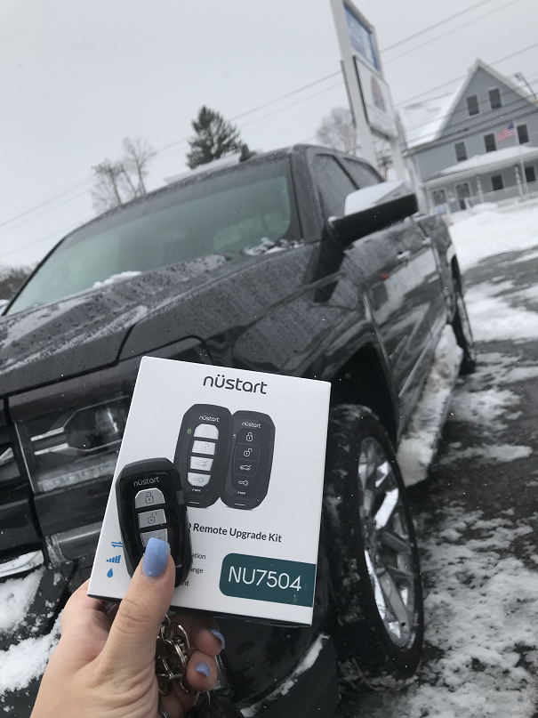 Technician performing car key copy in Malden, MA