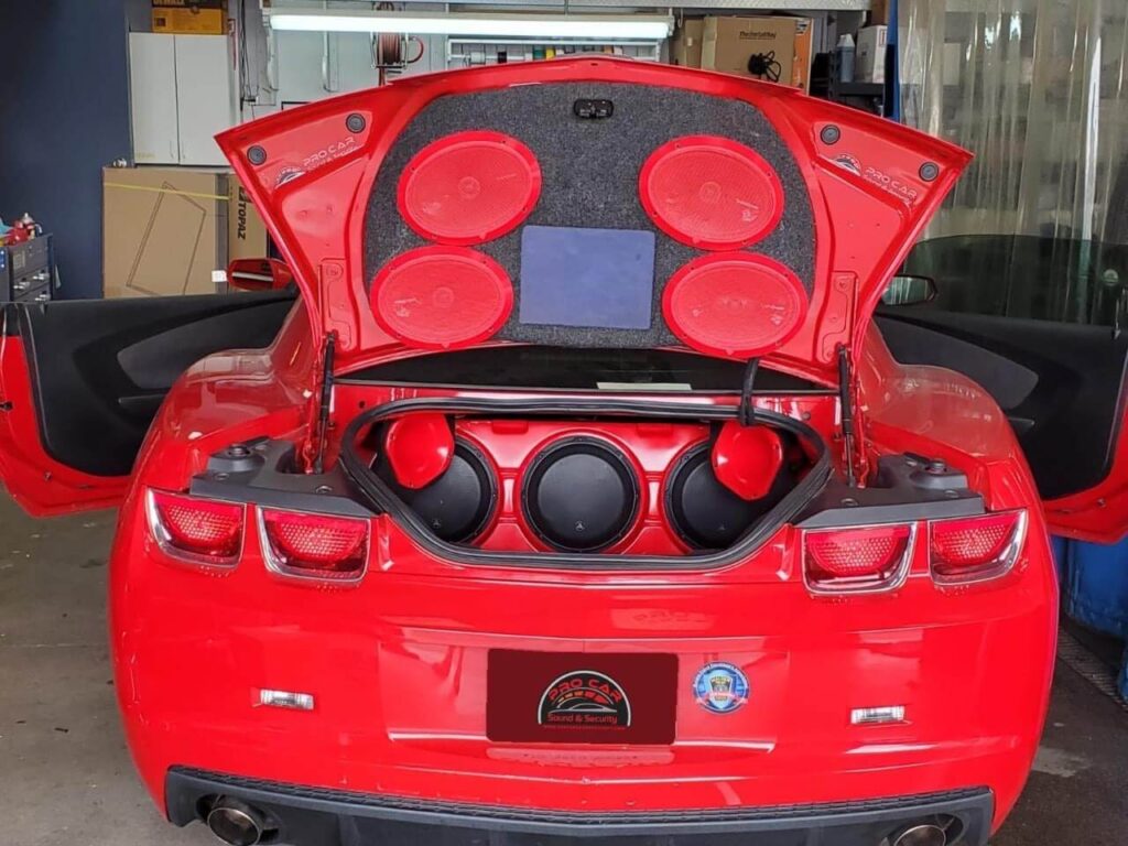 Speaker mounted with proper gasket in a car door in Malden, MA